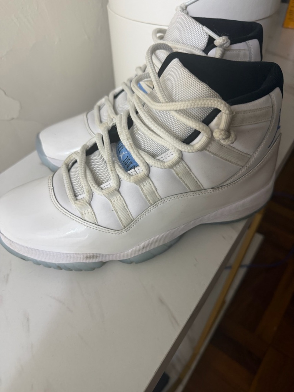 Retro 11 Jordan Men’s White and Black High-Top Sneakers with Light Blue Accents
